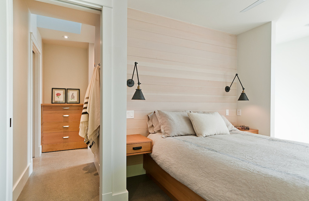 Diseño de dormitorio principal minimalista de tamaño medio sin chimenea con paredes blancas y suelo de cemento