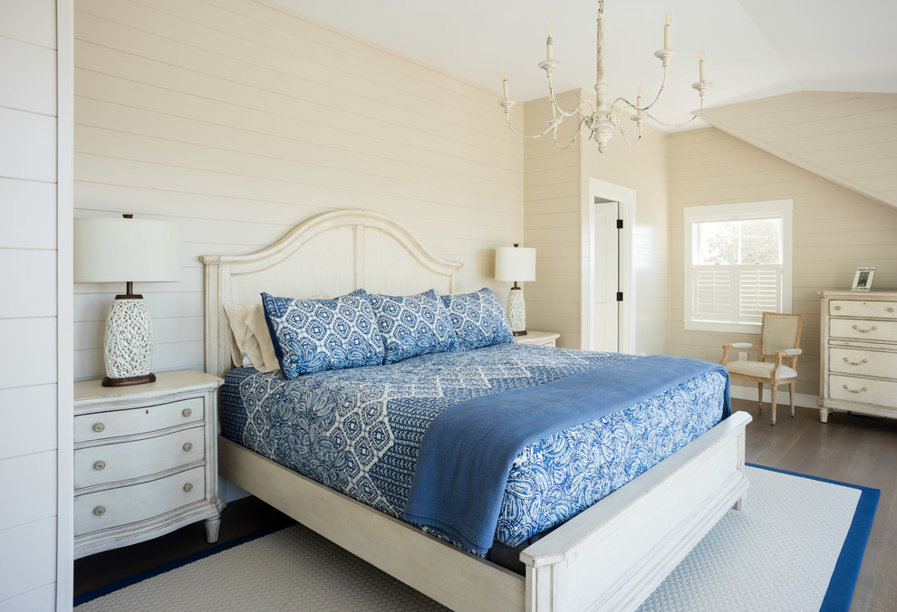 This is an example of a nautical bedroom in Providence with beige walls, dark hardwood flooring and brown floors.