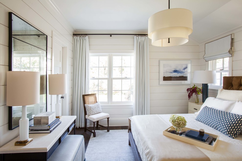 Inspiration for a traditional master bedroom in Houston with white walls.