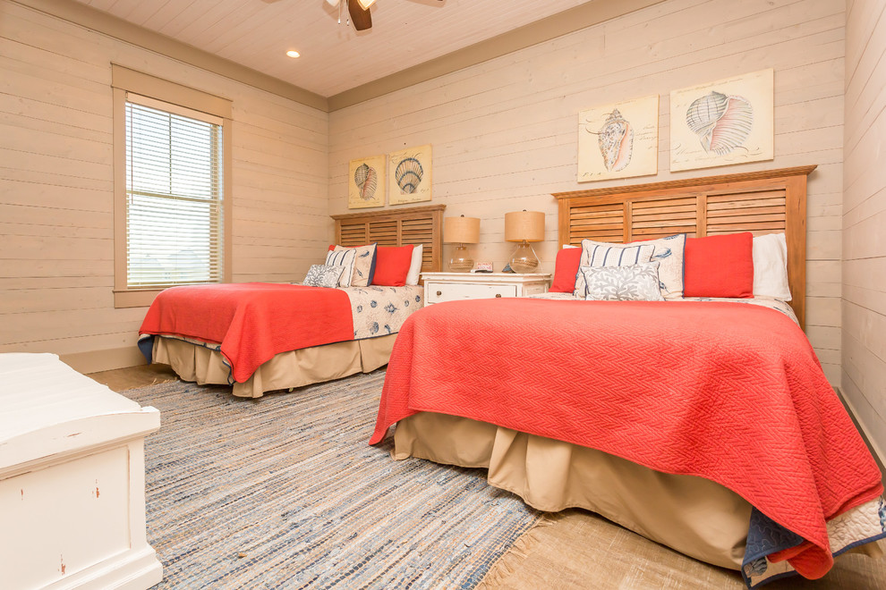 Immagine di una camera degli ospiti stile marinaro con pareti beige e pavimento in vinile