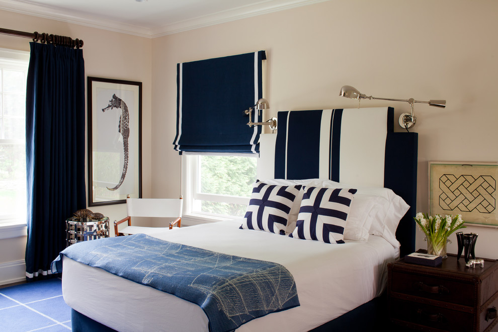 Bohemian bedroom in New York with beige walls and blue floors.