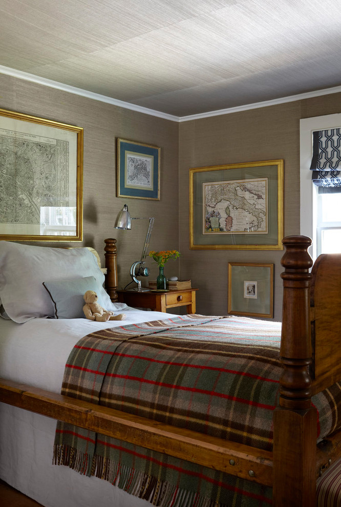 Example of a large classic guest bedroom design in New York with beige walls