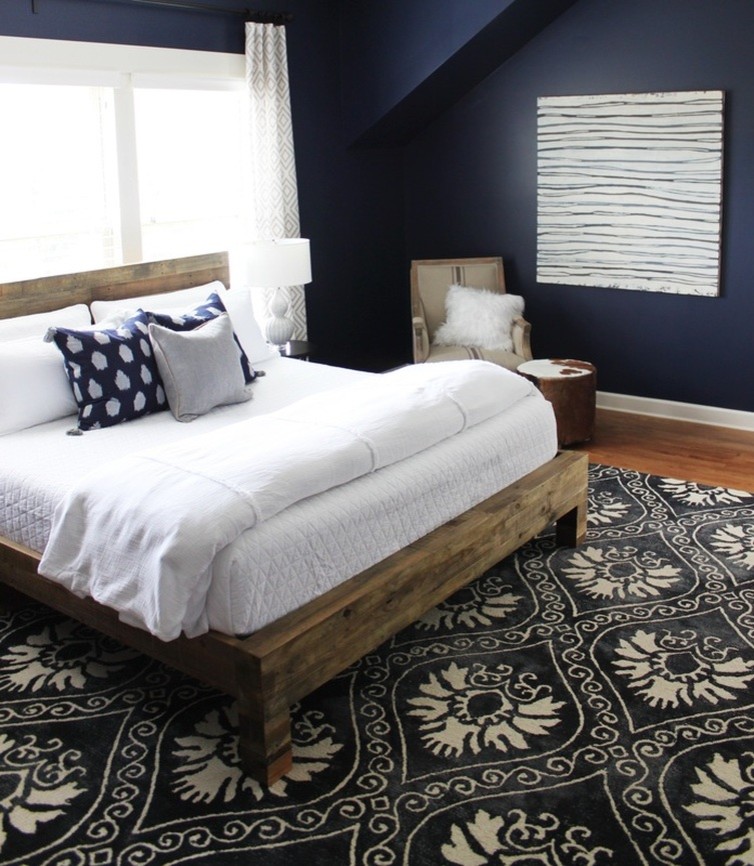 Example of a cottage bedroom design in Charlotte