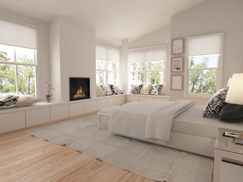 サンフランシスコにある広いコンテンポラリースタイルのおしゃれな主寝室 (白い壁、無垢フローリング、標準型暖炉、漆喰の暖炉まわり、茶色い床)