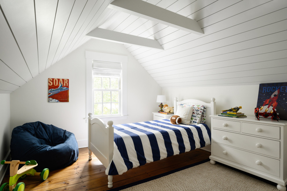 This is an example of a country bedroom in Boston with medium hardwood flooring and a timber clad ceiling.
