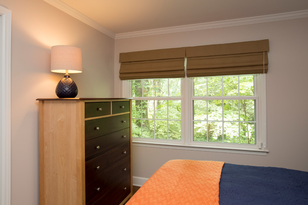 Bedroom - mid-sized transitional guest dark wood floor and brown floor bedroom idea in Raleigh with beige walls