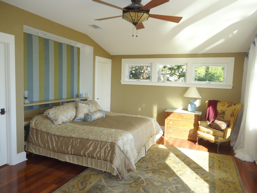 Example of an arts and crafts master medium tone wood floor bedroom design in Austin with brown walls