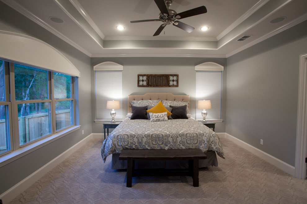Large arts and crafts master carpeted and beige floor bedroom photo in Austin with gray walls and no fireplace