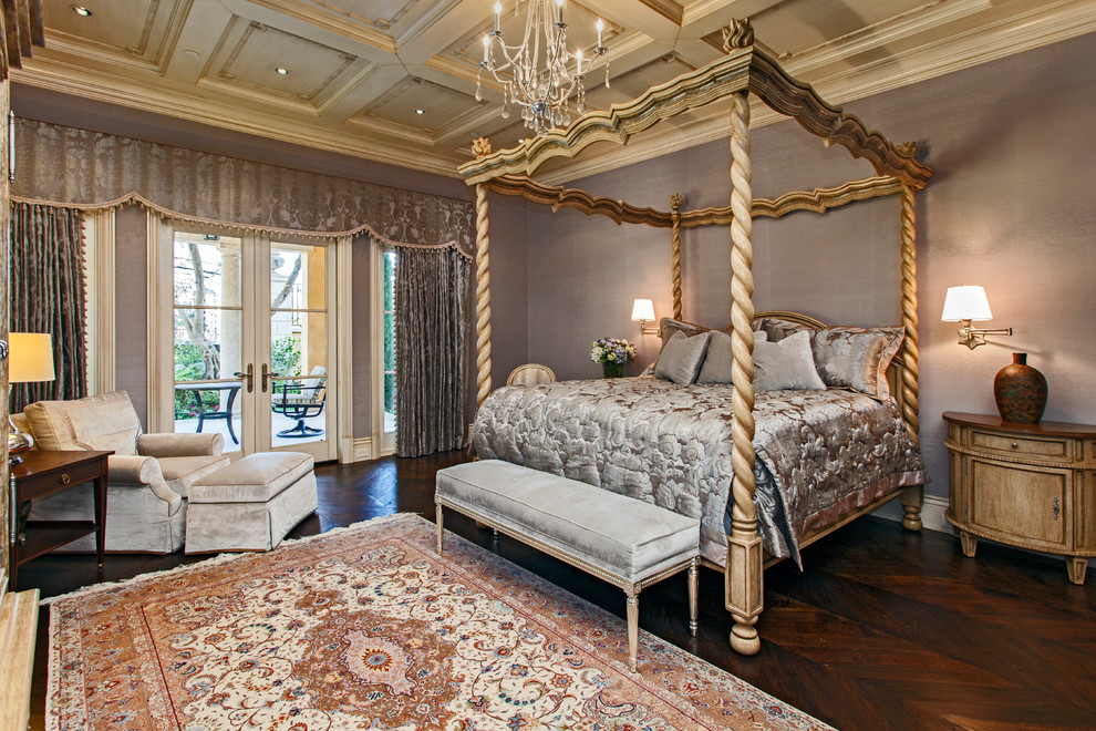 Mediterranean grey and brown bedroom in Orange County with grey walls, dark hardwood flooring and brown floors.