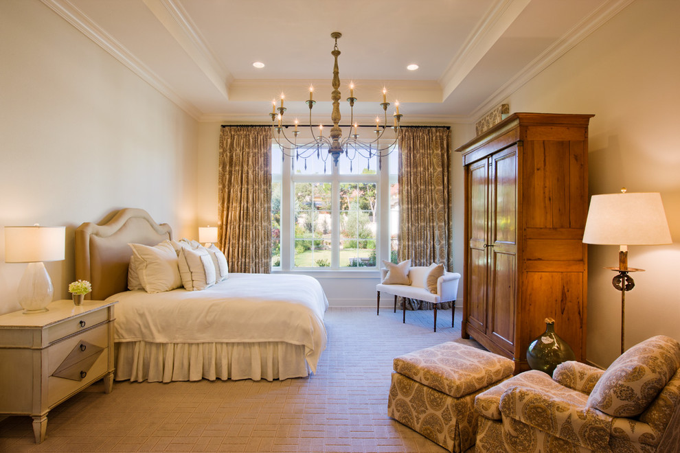 Example of a transitional master carpeted bedroom design in Austin with white walls