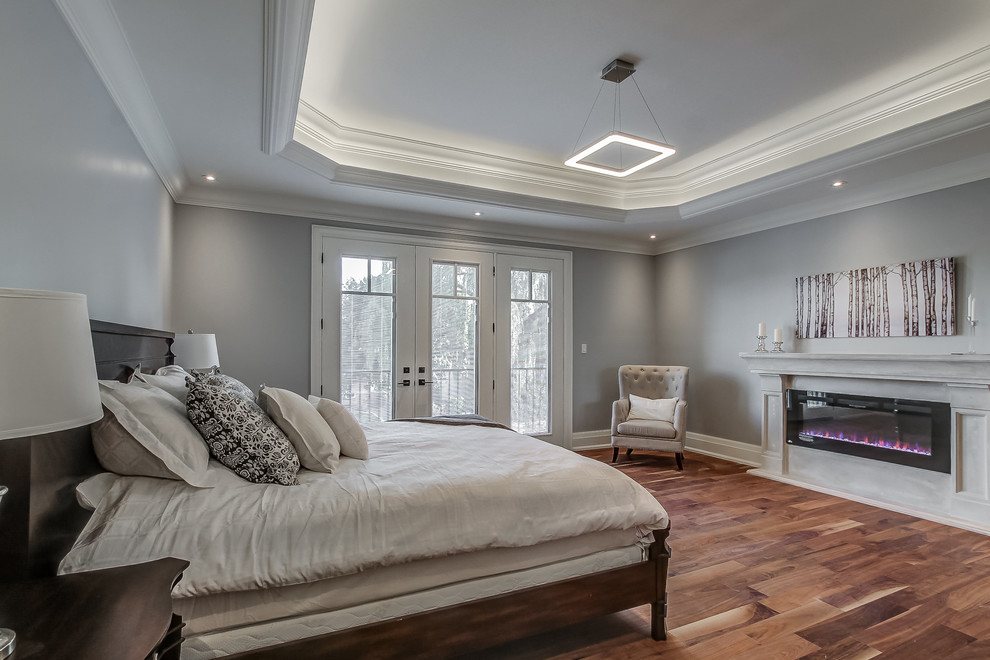 Large traditional bedroom in Toronto.
