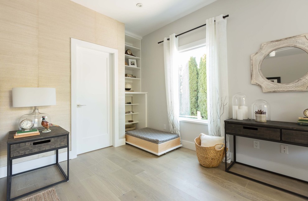 Medium sized traditional master bedroom in Calgary with white walls, light hardwood flooring and beige floors.