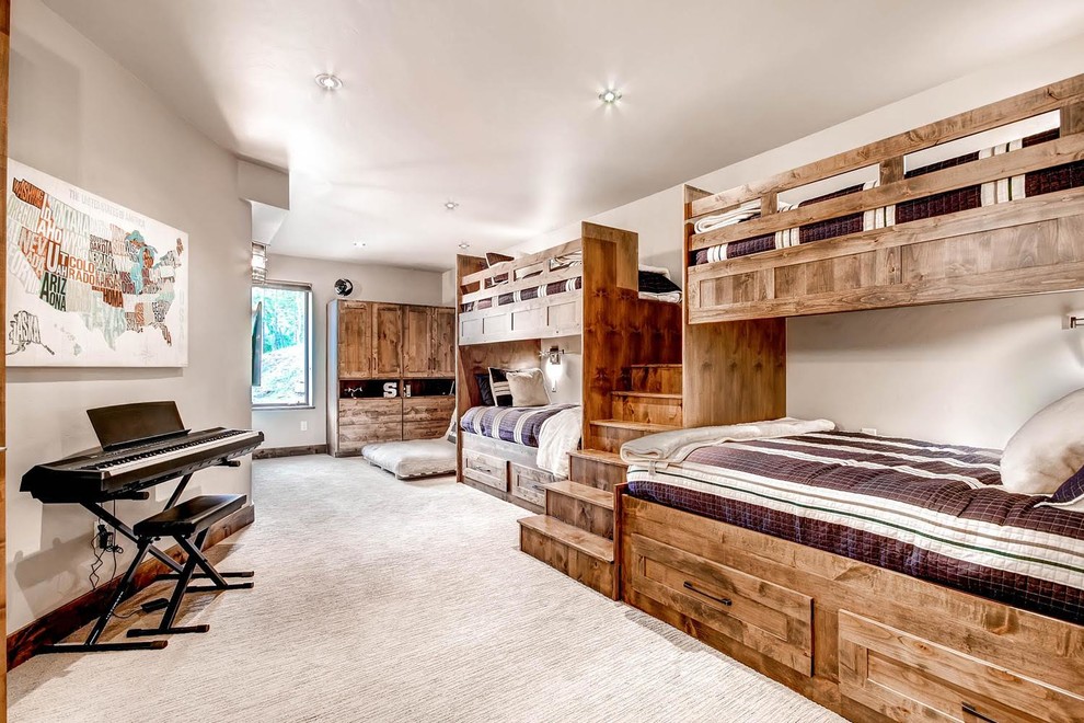 Bedroom - large rustic guest carpeted and beige floor bedroom idea in Denver with gray walls and no fireplace
