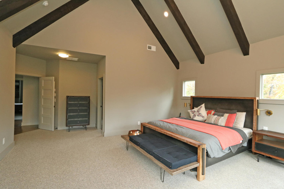 Photo of a large contemporary master and grey and brown bedroom in Atlanta with beige walls, carpet, a wood burning stove and brown floors.