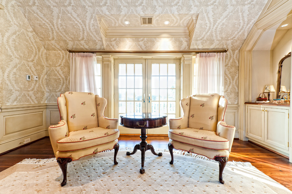 Elegant loft-style medium tone wood floor bedroom photo in New York