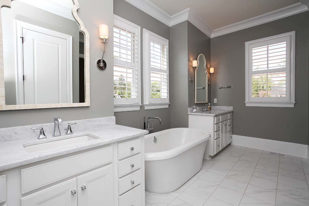 Design ideas for a large classic bathroom in Charlotte with grey walls and marble flooring.