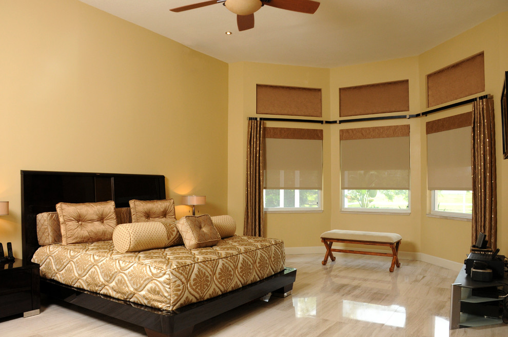 Mid-sized transitional master porcelain tile and beige floor bedroom photo in Tampa with yellow walls and no fireplace