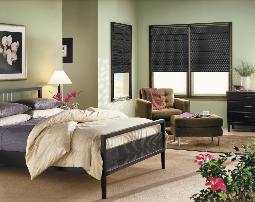 Example of a mid-sized minimalist guest dark wood floor bedroom design in Cedar Rapids with gray walls