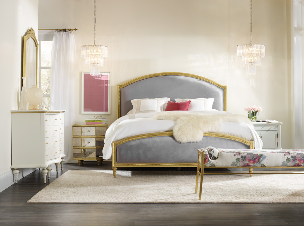Design ideas for a large classic master and grey and pink bedroom in New York with beige walls, dark hardwood flooring, no fireplace and brown floors.