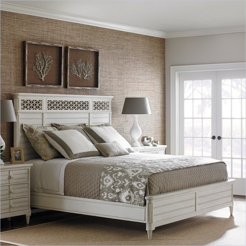 Photo of a beach style master bedroom in Charleston with light hardwood flooring and beige floors.