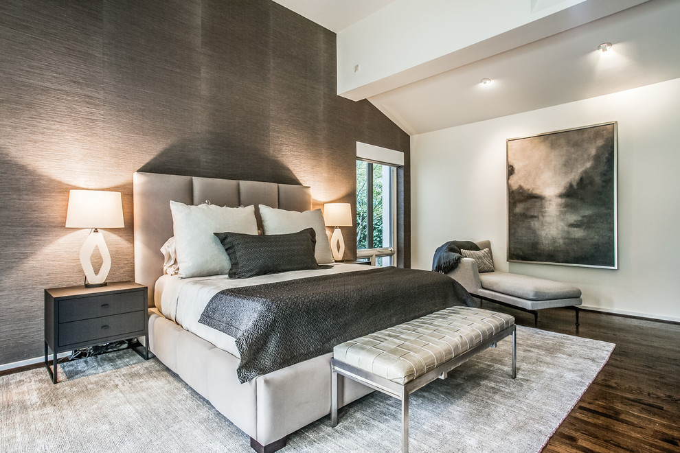 Traditional master bedroom in Austin with grey walls and dark hardwood flooring.