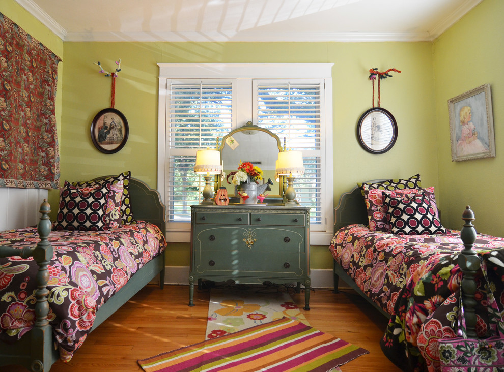 Inspiration for a victorian bedroom remodel in Dallas with green walls