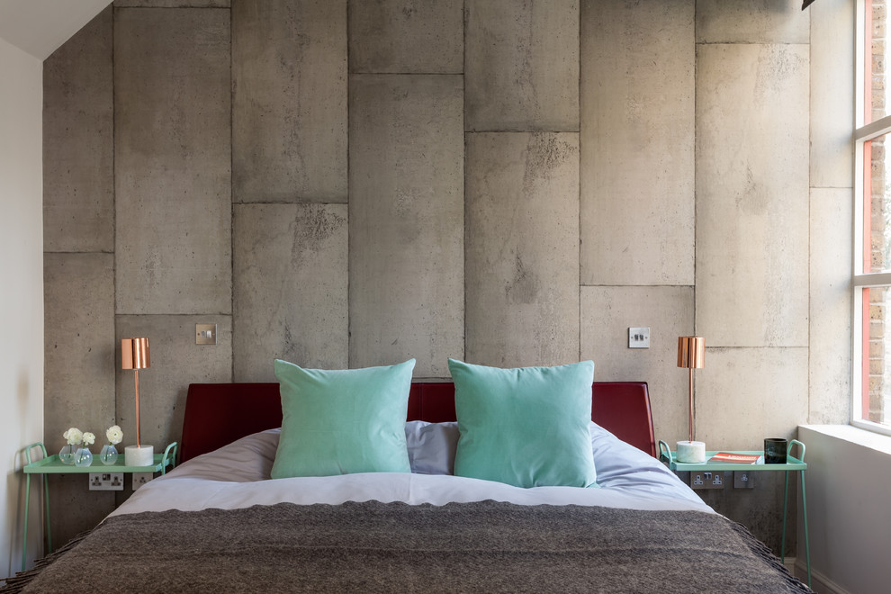 Urban master bedroom photo in London