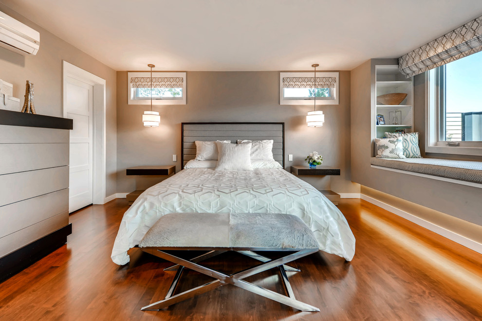 Design ideas for a contemporary bedroom in Denver with grey walls, dark hardwood flooring and brown floors.