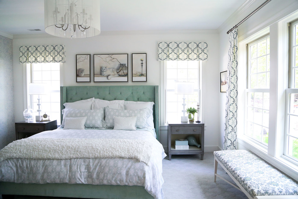 Inspiration for a large classic master bedroom in Indianapolis with white walls and carpet.