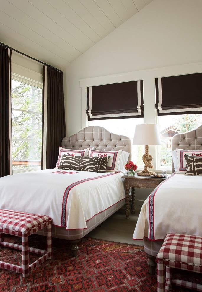 Example of a transitional guest bedroom design in Seattle with white walls