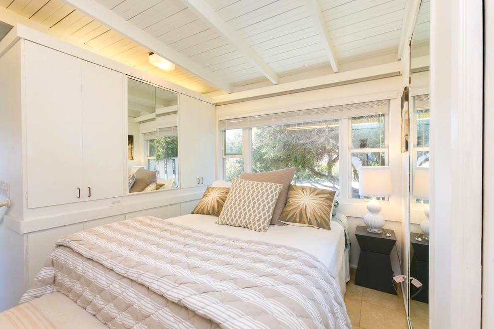 Inspiration for a small nautical guest bedroom in San Diego with ceramic flooring.