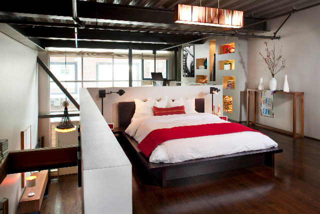 Immagine di una camera da letto industriale