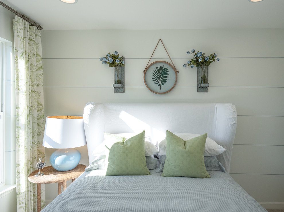 Inspiration for a coastal guest bedroom in DC Metro with white walls and no fireplace.