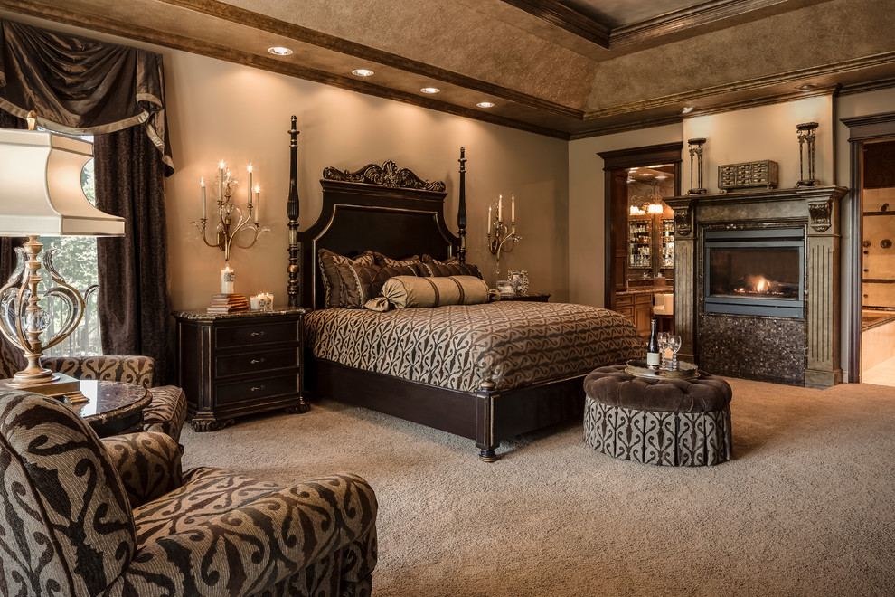Свежая идея для дизайна: хозяйская спальня среднего размера в классическом стиле с коричневыми стенами, ковровым покрытием, двусторонним камином и фасадом камина из плитки - отличное фото интерьера