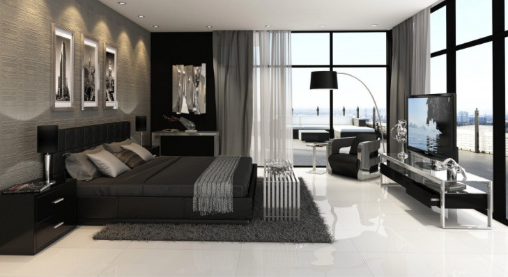Cette photo montre une grande chambre moderne avec un mur gris.
