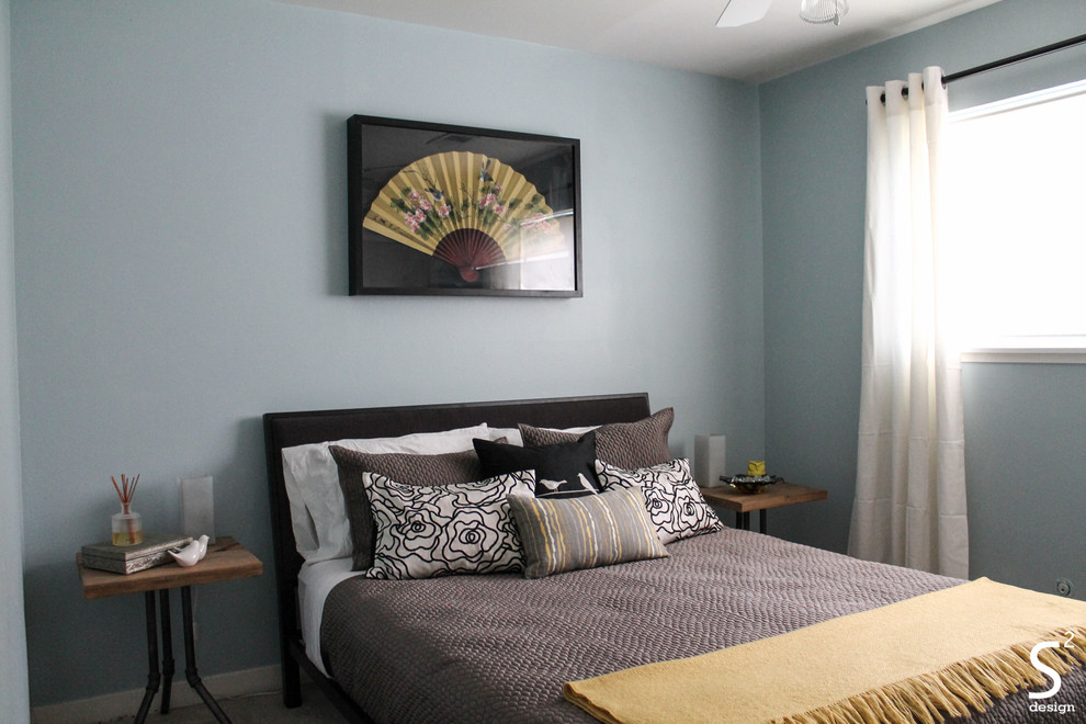Inspiration for a mid-sized modern guest carpeted bedroom remodel in Houston with blue walls