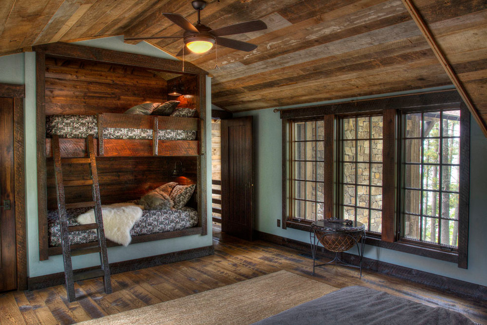 Photo of a rustic bedroom in Minneapolis.