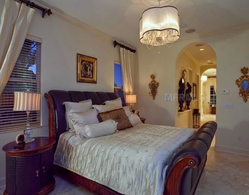 Example of a mid-sized classic master bedroom design in Tampa with beige walls