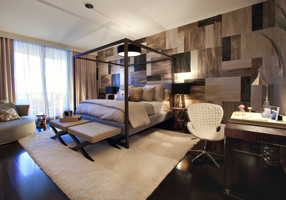 Photo of a modern bedroom in Miami with dark hardwood flooring and no fireplace.