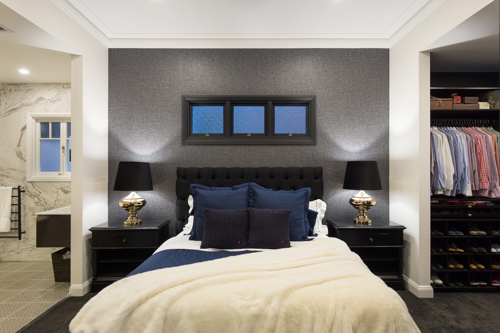 Idée de décoration pour une chambre tradition avec un mur gris et un sol noir.