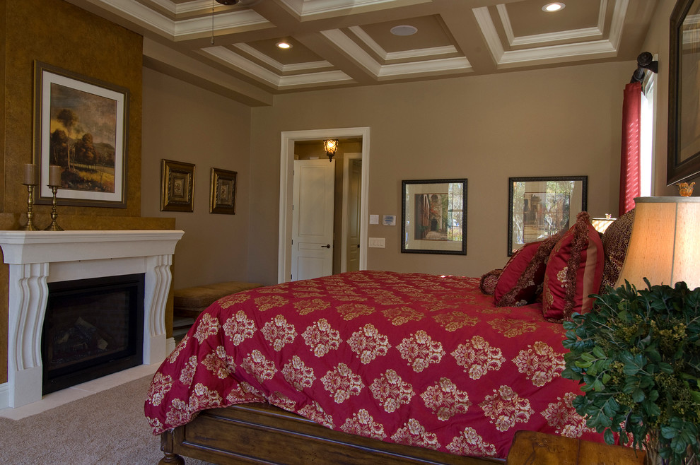 Example of a tuscan bedroom design in Tampa