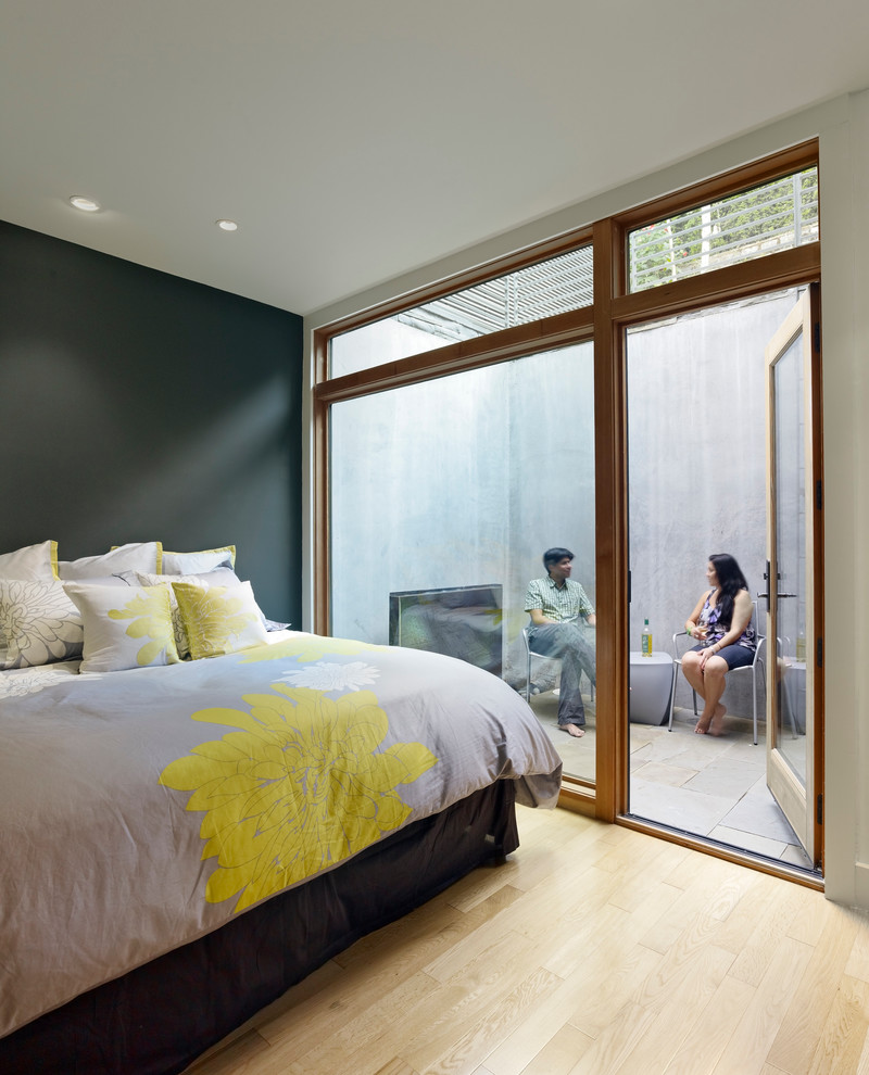 Bedroom - modern bedroom idea in San Francisco with gray walls