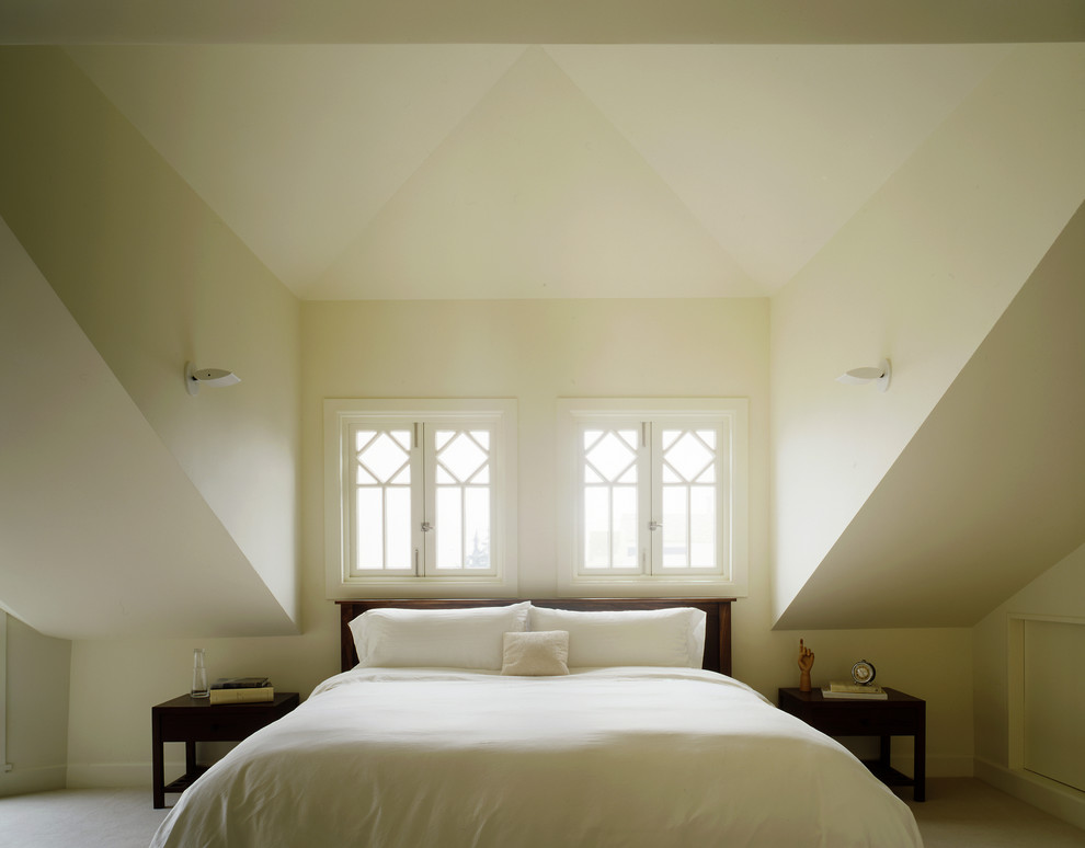 Bedroom - victorian bedroom idea in San Francisco with beige walls