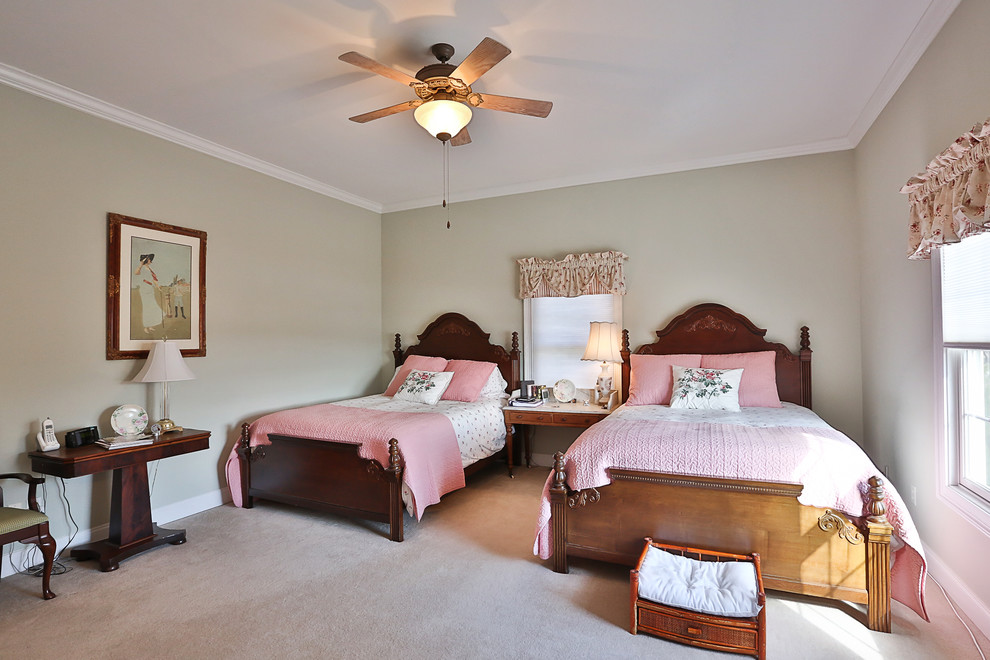 Example of a large classic guest carpeted bedroom design in Atlanta with beige walls and no fireplace