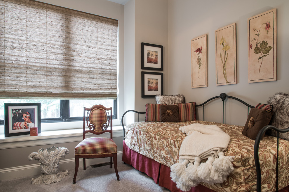 Example of a transitional bedroom design in St Louis