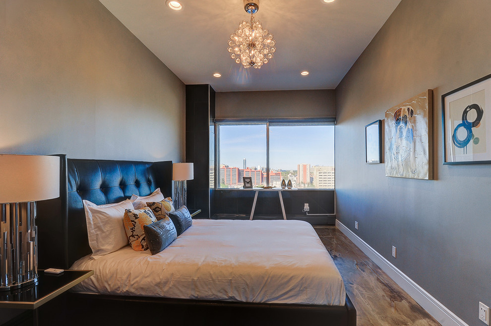Imagen de dormitorio principal contemporáneo de tamaño medio sin chimenea con paredes grises, suelo de cemento y suelo multicolor
