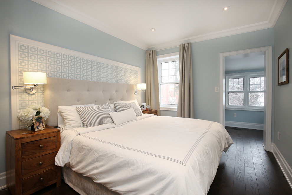 Bedroom - mid-sized transitional master medium tone wood floor bedroom idea in Toronto with blue walls and no fireplace
