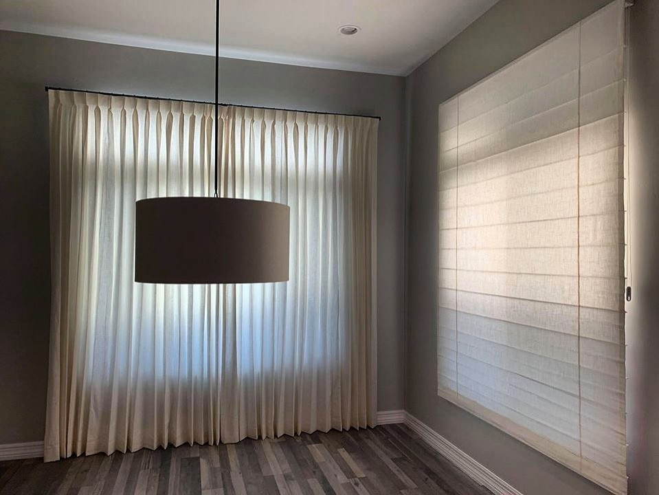 This is an example of a medium sized classic guest bedroom in Phoenix with grey walls, plywood flooring, grey floors and a drop ceiling.