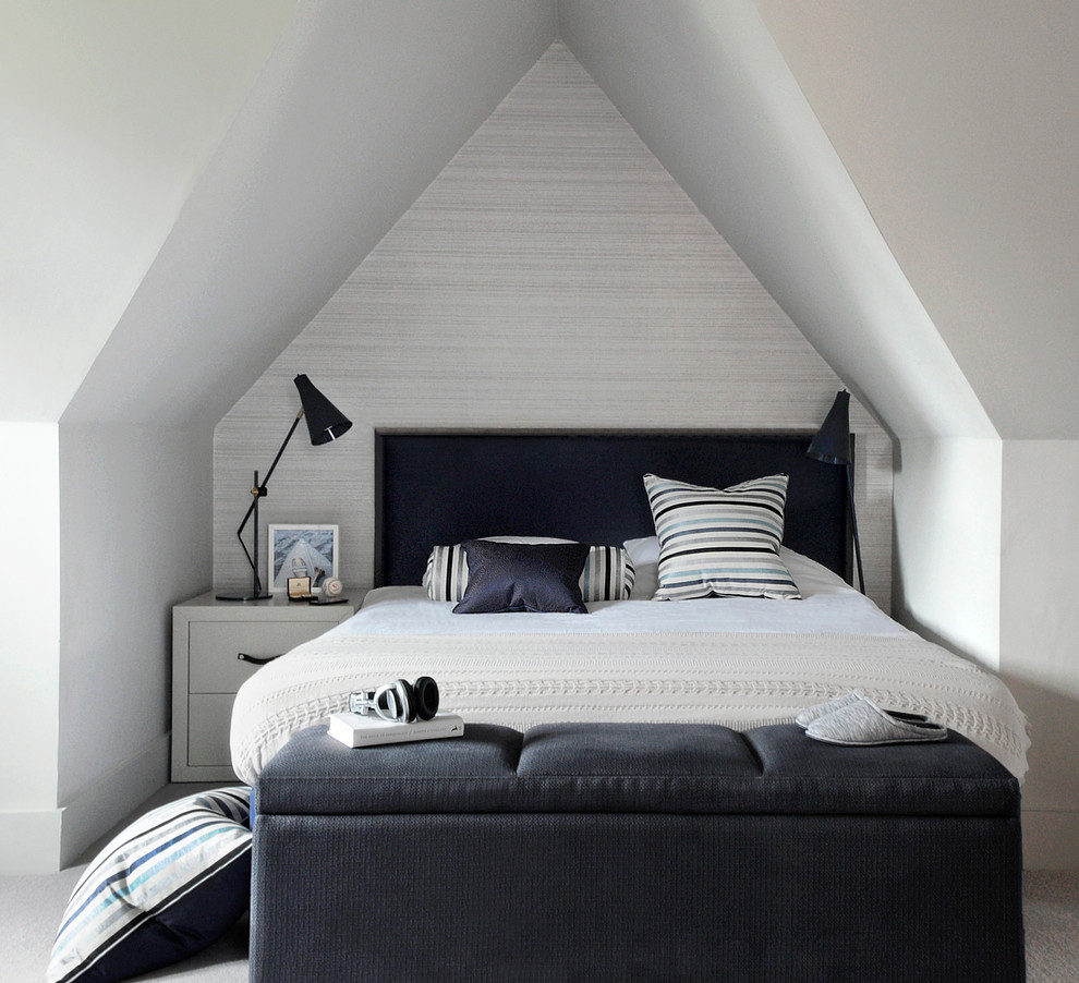 Inspiration for a small contemporary guest carpeted bedroom remodel in London with gray walls and no fireplace