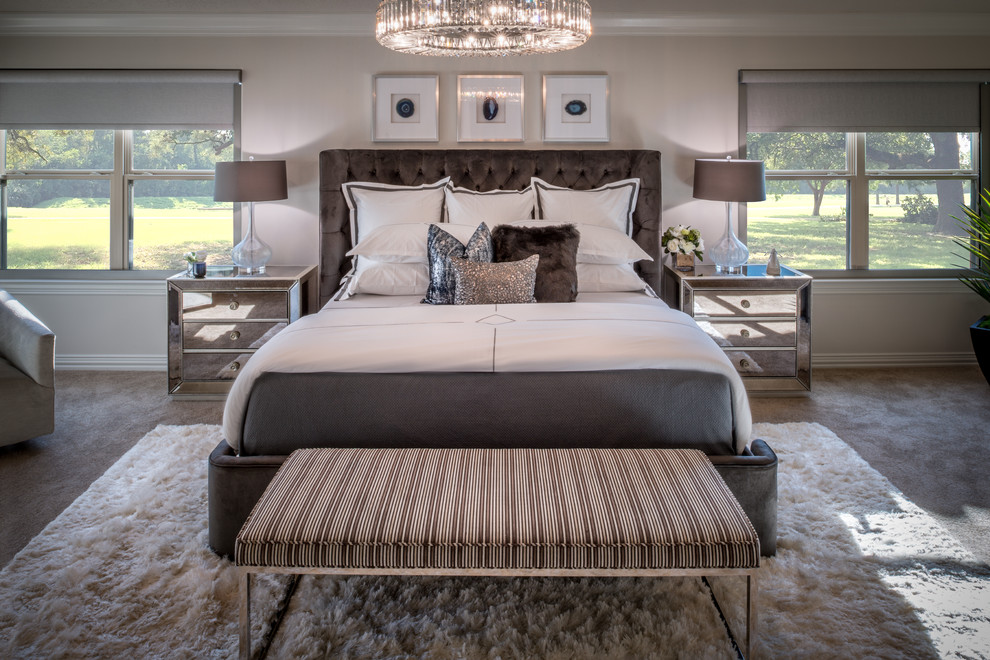 This is an example of a large classic master and grey and brown bedroom in Houston with beige walls and carpet.